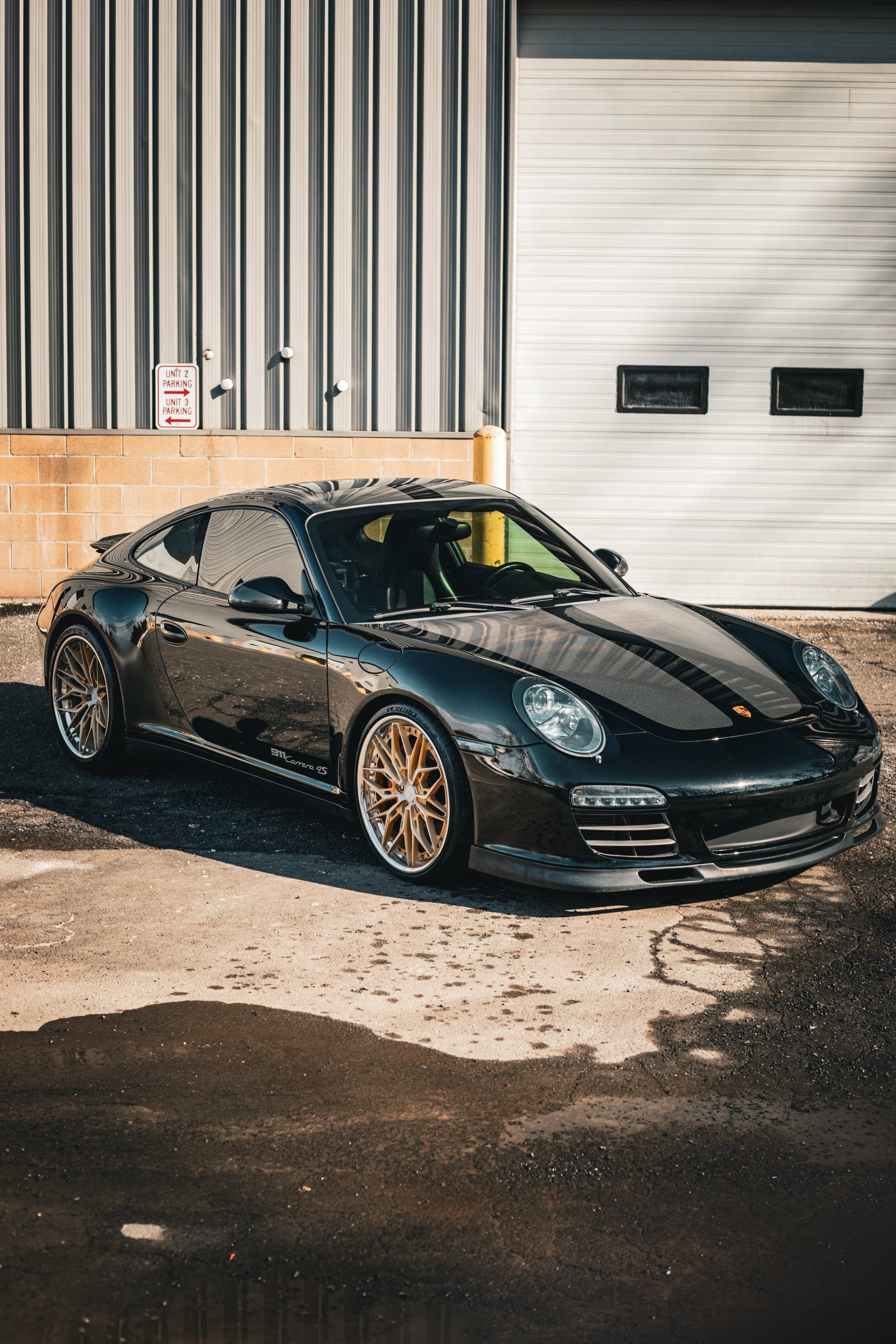 Porsche 911 in Metallic Black + Gloss Carbon Fiber accents by ONE PPF, photo 1
