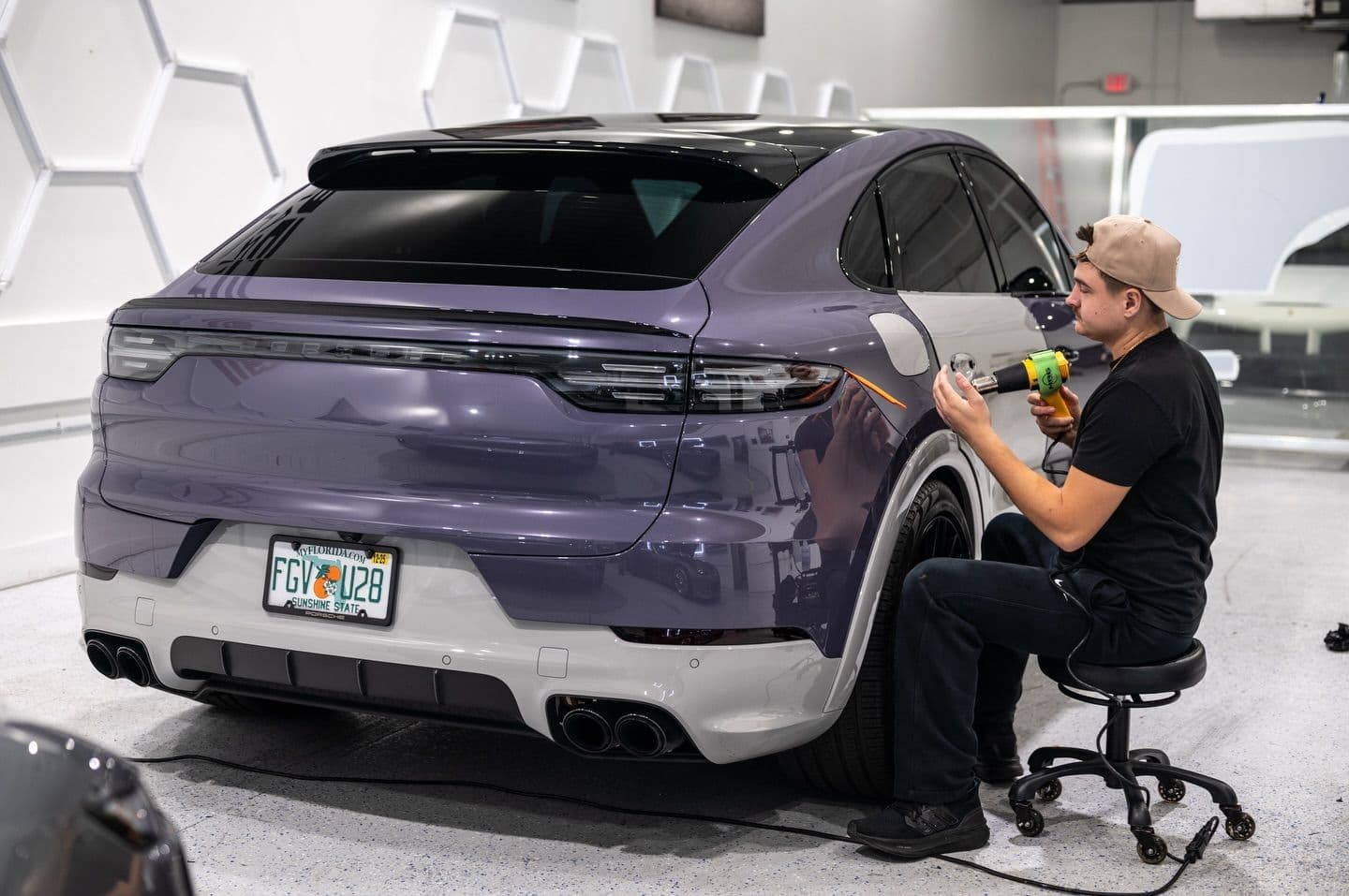 Porsche Cayenne in Purple Ash Gloss Metallic PPF, hero shot at Sage Auto Studios